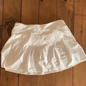 White pleated tennis skirt from Athleta